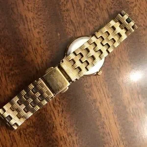 Tauan | Accessories | Tauan Gold Tone Band Black Face Swiss  display picture 1